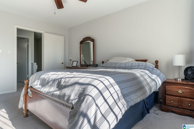 bedroom featuring ceiling fan and light carpet