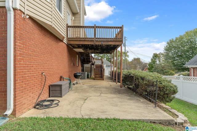 view of patio featuring a deck and central air condition unit