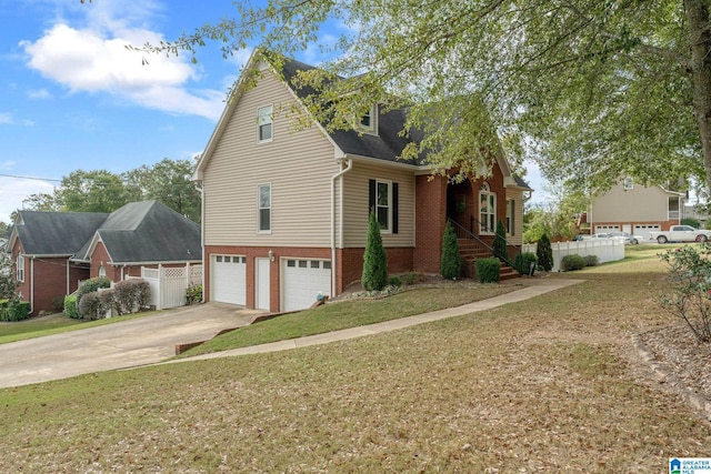 view of front of property with a garage and a front lawn