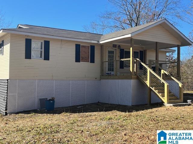 back of house with covered porch