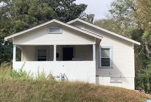 bungalow-style house featuring covered porch