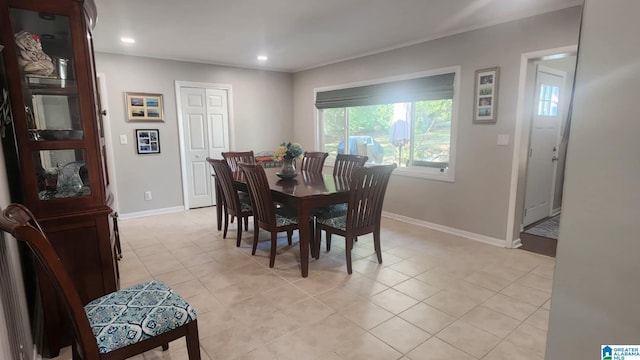 dining room featuring light tile patterned floors