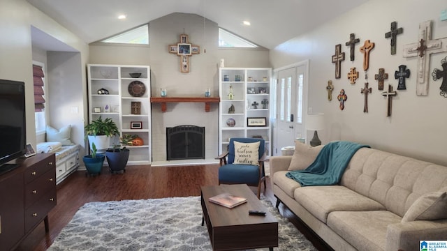 living room with lofted ceiling and dark hardwood / wood-style floors