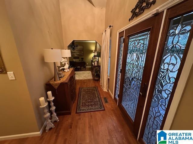 doorway featuring hardwood / wood-style floors