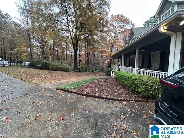 view of yard featuring a porch