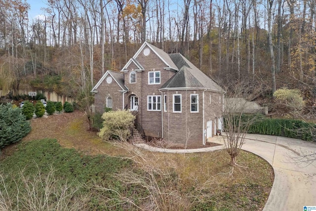 view of side of home with a garage