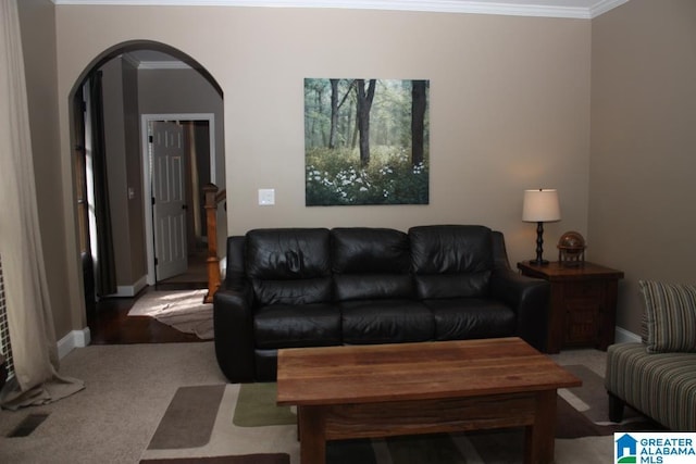 living room featuring crown molding and light carpet