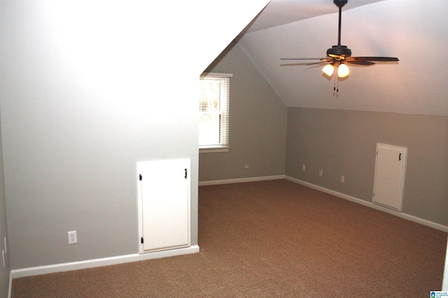 bonus room with ceiling fan, carpet floors, and vaulted ceiling