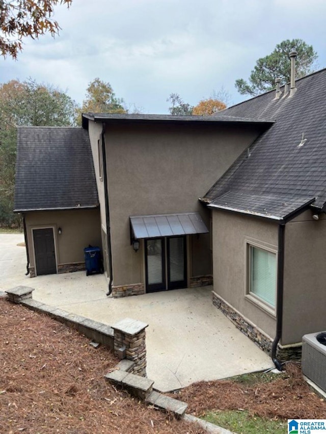 rear view of house featuring a patio