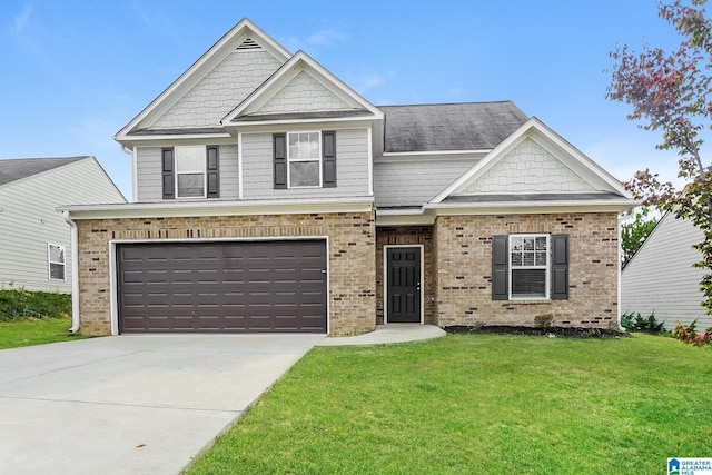 craftsman-style house featuring a garage and a front lawn