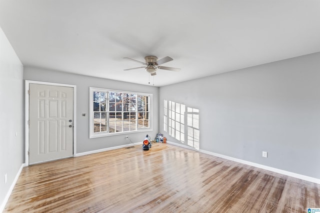 interior space featuring light hardwood / wood-style flooring and ceiling fan