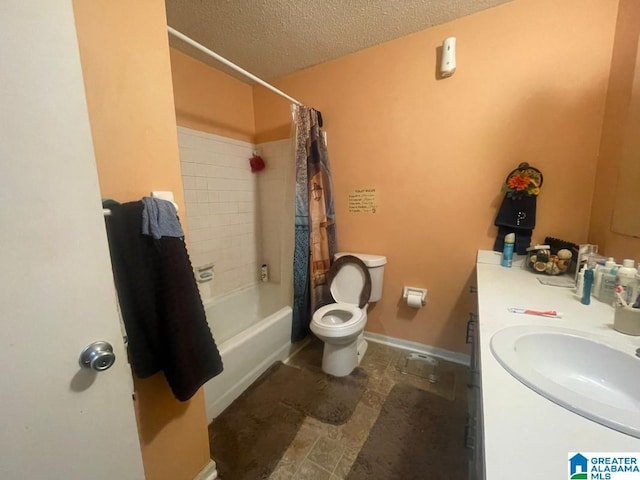 full bathroom with vanity, shower / tub combo, a textured ceiling, and toilet