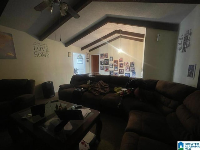 home theater room featuring lofted ceiling with beams and ceiling fan