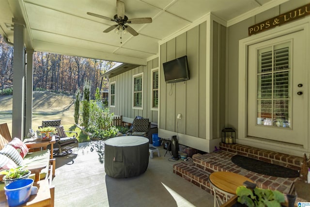 view of patio / terrace featuring ceiling fan