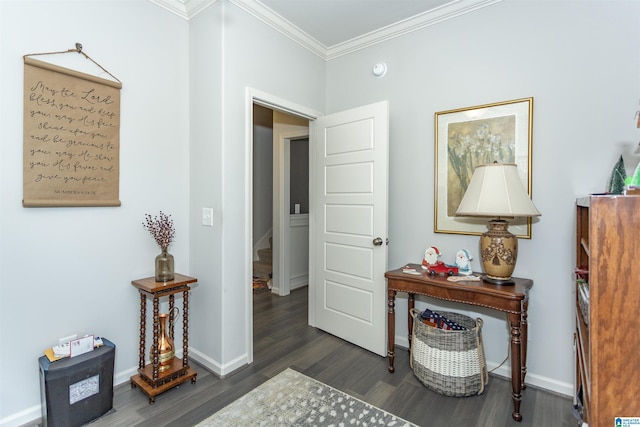 hall featuring dark hardwood / wood-style floors and crown molding