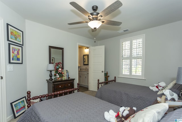 bedroom featuring ceiling fan, sink, and connected bathroom