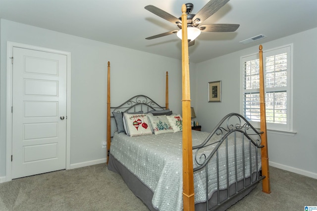 carpeted bedroom with ceiling fan