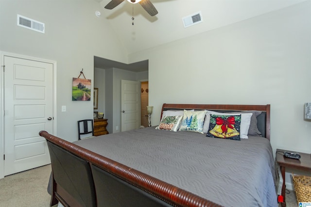 carpeted bedroom with high vaulted ceiling and ceiling fan