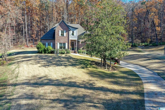 view of front of home with a front lawn