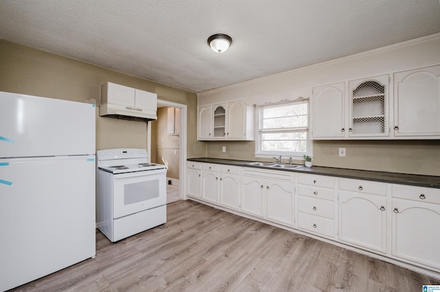 kitchen featuring white cabinetry, white appliances, a textured ceiling, and light hardwood / wood-style flooring