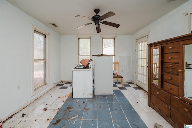 foyer with ceiling fan