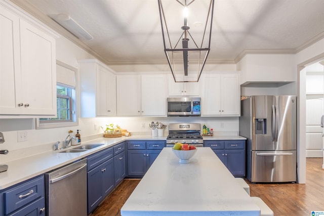 kitchen with white cabinets, wood-type flooring, sink, and appliances with stainless steel finishes