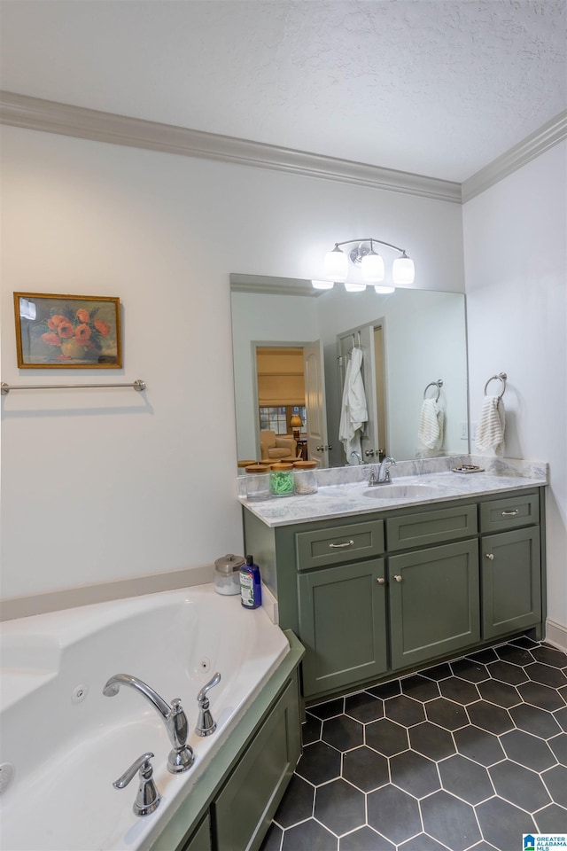 bathroom featuring crown molding, a bathtub, vanity, and a textured ceiling