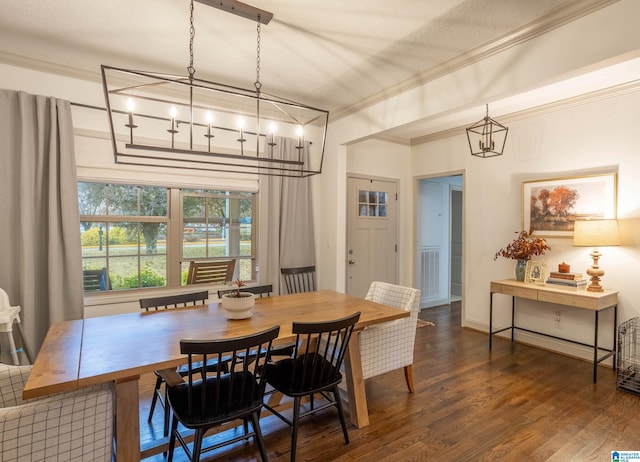 dining room featuring dark hardwood / wood-style floors and ornamental molding