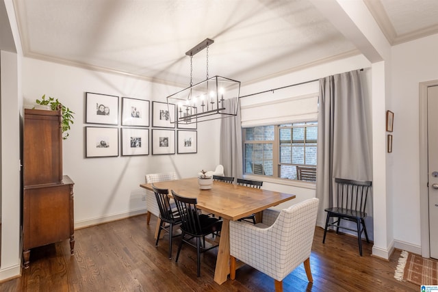 dining space with crown molding, dark wood-type flooring, and a notable chandelier