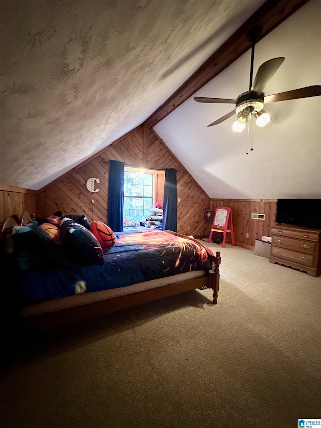 bedroom featuring carpet flooring, lofted ceiling with beams, ceiling fan, and wooden walls