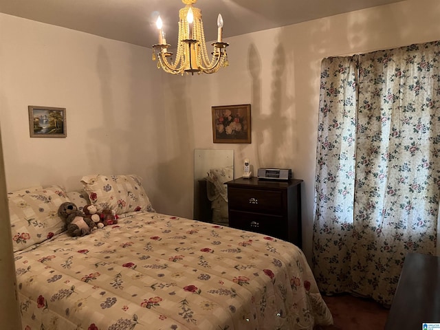 bedroom featuring a chandelier