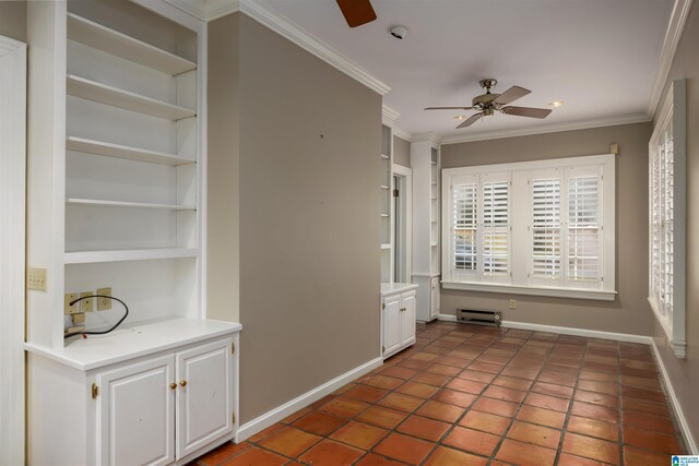 interior space featuring ceiling fan, built in features, and crown molding