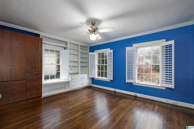 unfurnished bedroom with ceiling fan, dark hardwood / wood-style floors, and crown molding