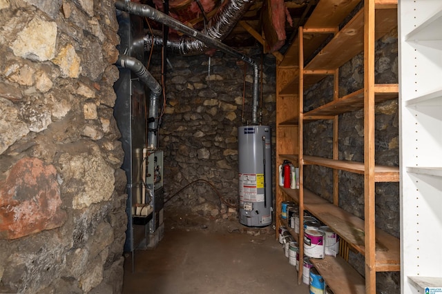 utility room with gas water heater