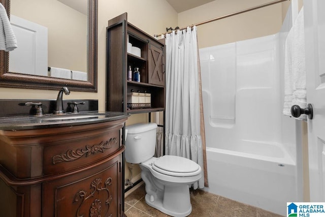 full bathroom featuring toilet, vanity, tile patterned floors, and shower / bath combo with shower curtain