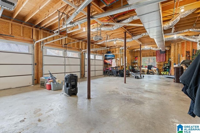 garage featuring a garage door opener