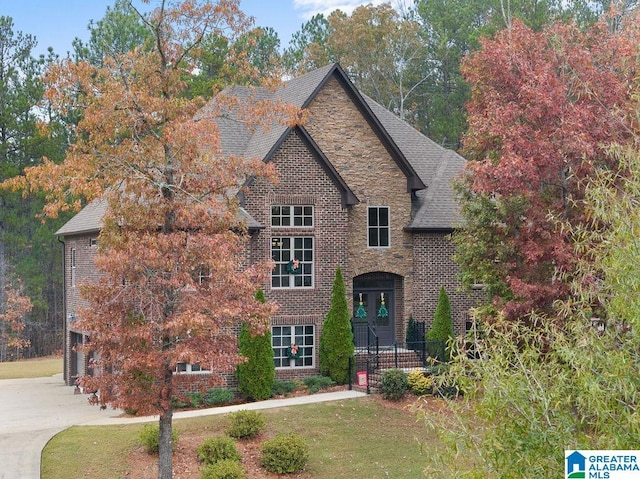 view of front of home with a front yard