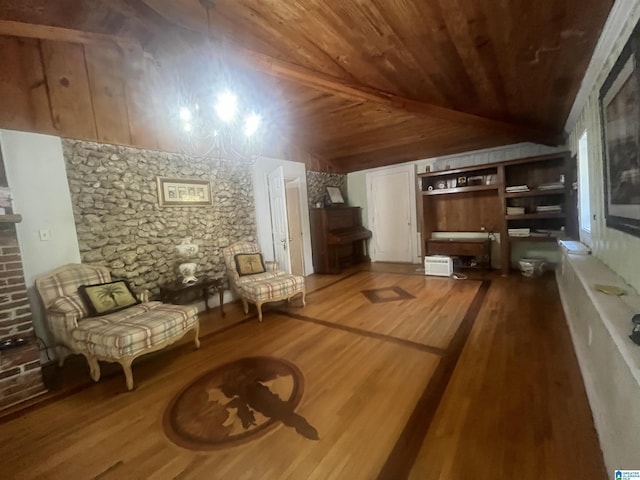 unfurnished room with hardwood / wood-style floors, lofted ceiling, and wood ceiling