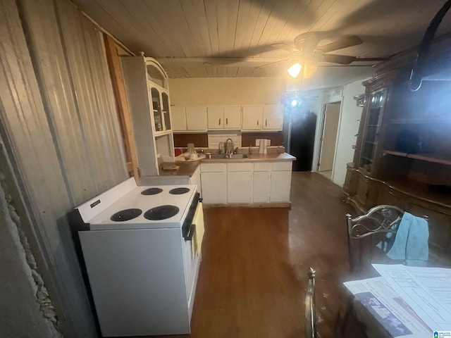 kitchen featuring ceiling fan, sink, hardwood / wood-style flooring, white cabinets, and white range with electric cooktop