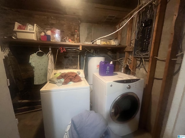 laundry area featuring washing machine and clothes dryer