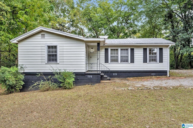 view of front of home with a front yard