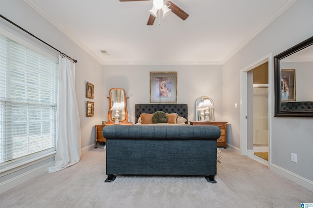 bedroom with light carpet, ceiling fan, and crown molding