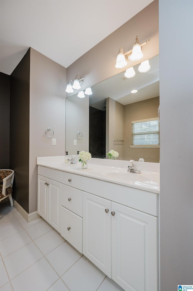 bathroom with vanity and tile patterned floors