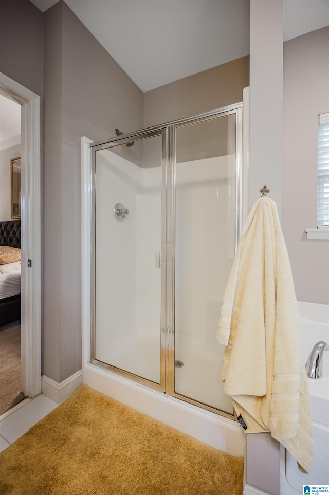 bathroom featuring walk in shower