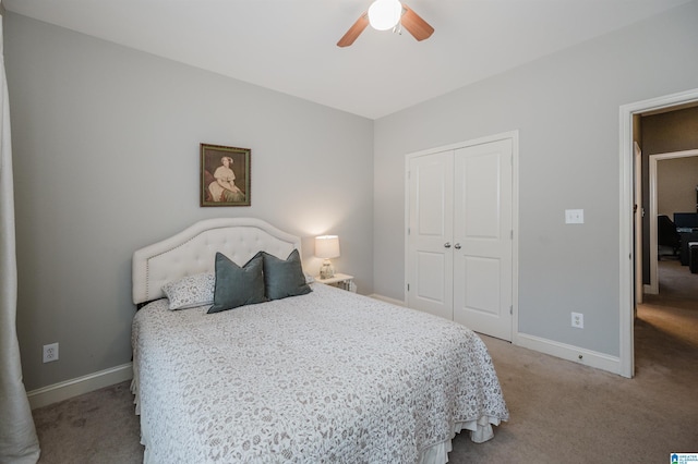 bedroom with light carpet, a closet, and ceiling fan