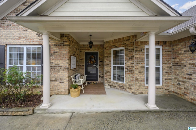 doorway to property with a porch