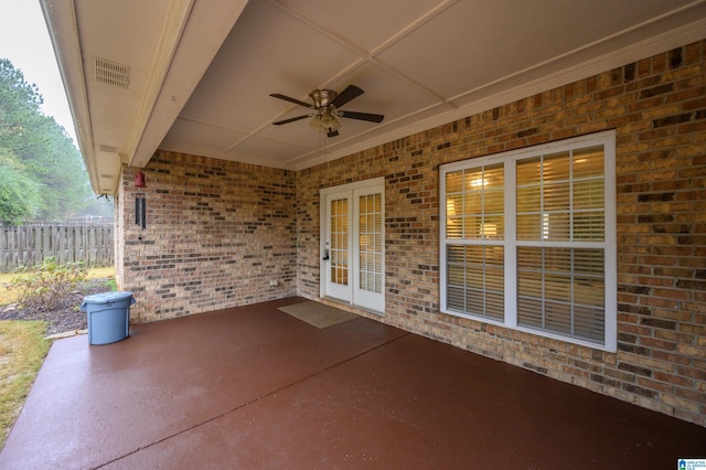 view of patio featuring ceiling fan and french doors