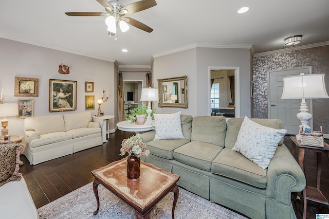 living room with ceiling fan, ornamental molding, and hardwood / wood-style flooring