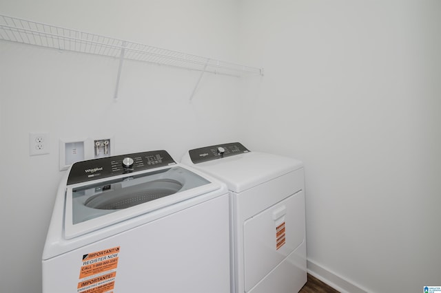 laundry room featuring independent washer and dryer, laundry area, and baseboards