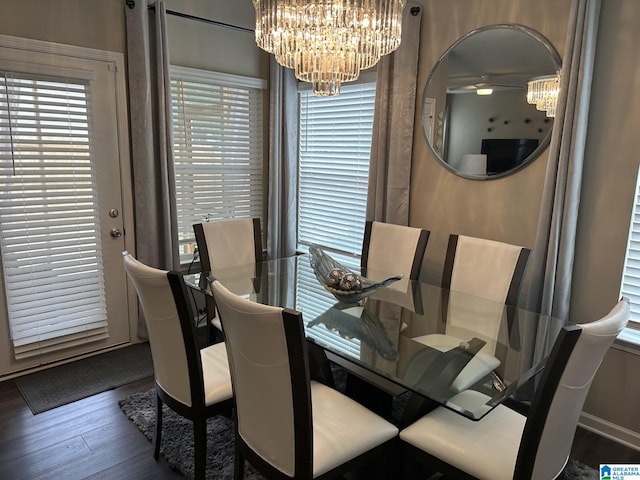 dining area featuring dark hardwood / wood-style floors and ceiling fan